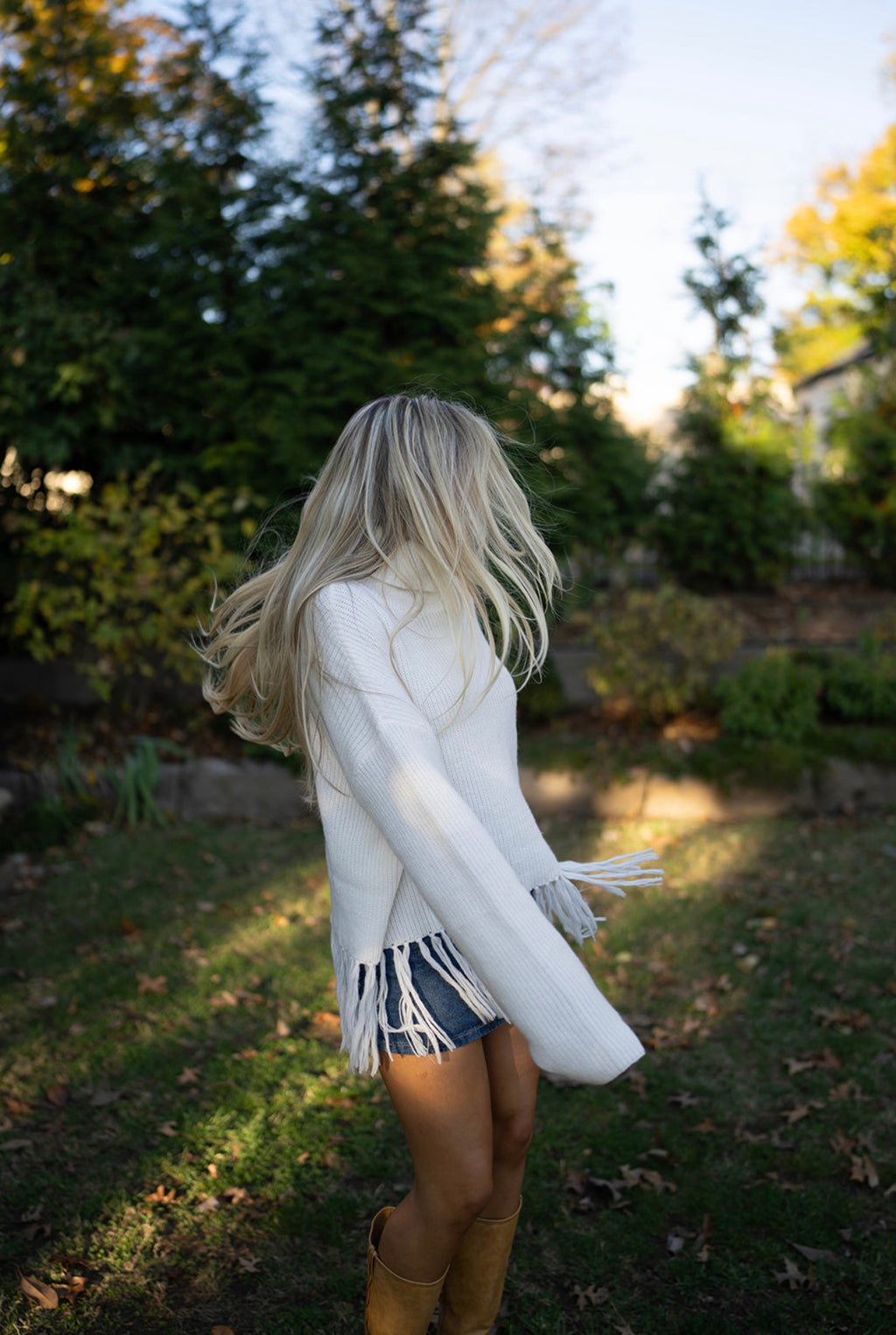The Fawn Fringe Turtleneck Sweater