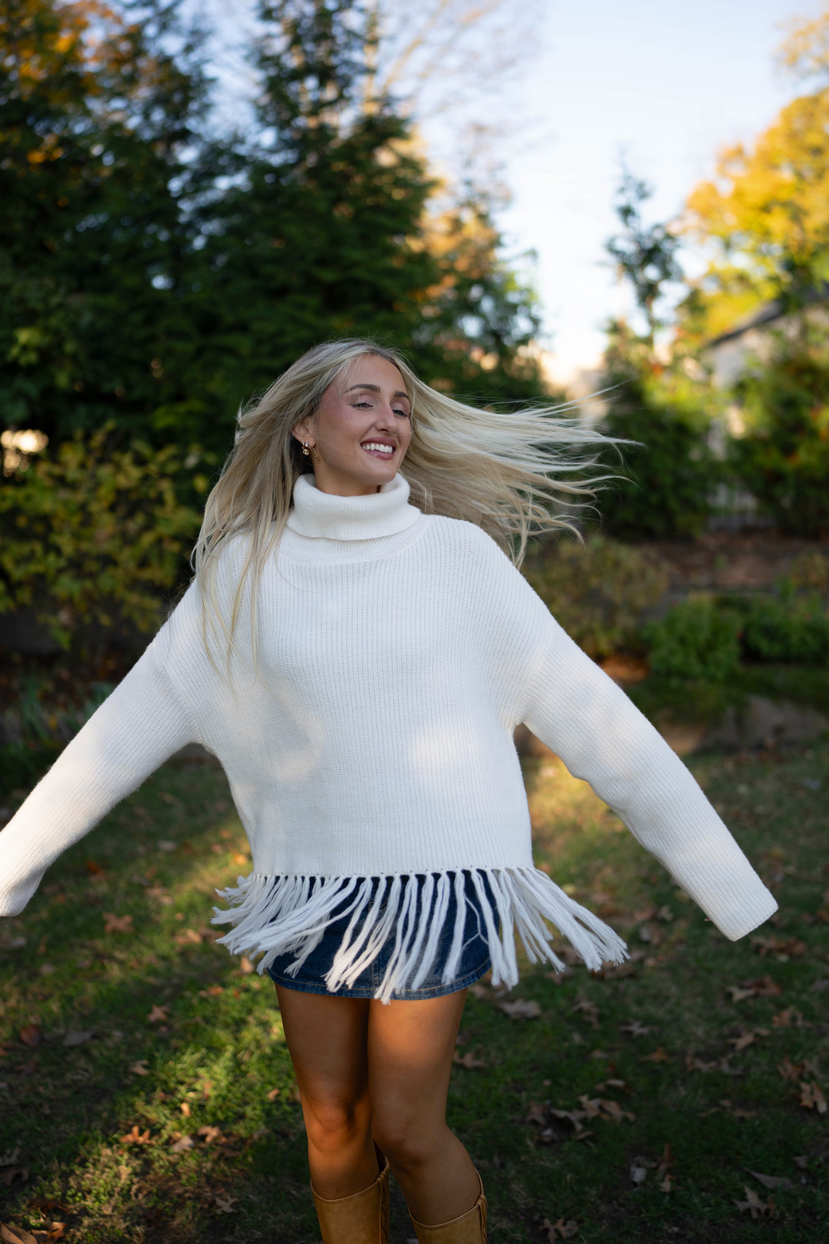 The Fawn Fringe Turtleneck Sweater